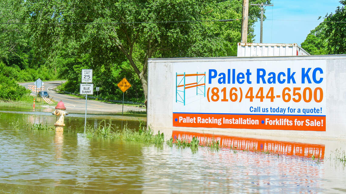 Floods keep shutting down roads on edge of KC. City, county say not their problem