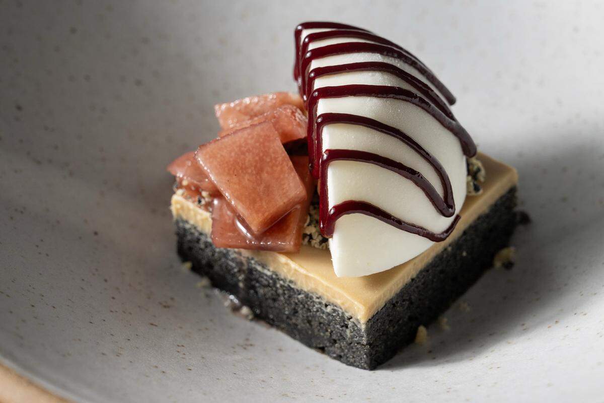 Executive Pastry Chef Helen Jo Leach of The Town Company, who has been nominated for a James Beard award, made a Black Sesame Almond Cake with red wine poached pears and yogurt ice cream. The item is a staple on the menu for the James Beard nominated pastry chef. 