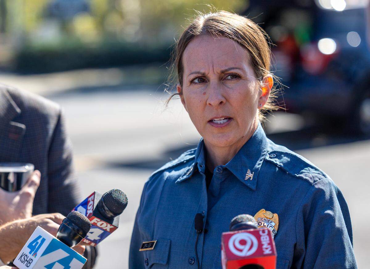 Kansas City Police Chief Stacey Graves speaks with the media along Troost Avenue near the scene of a crash involving a police officer on Wednesday.
