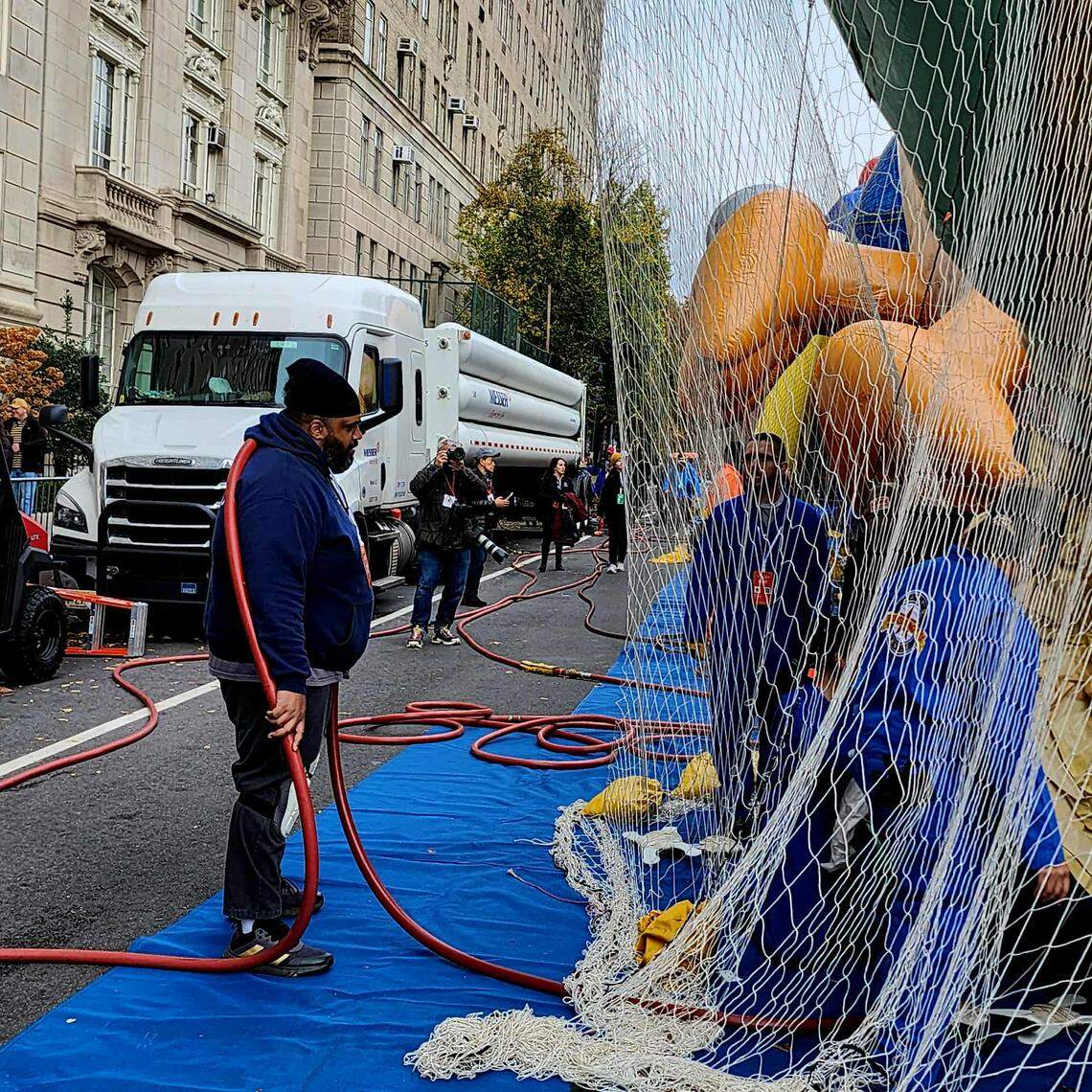 A Macy’s parade balloon being filled with helium.