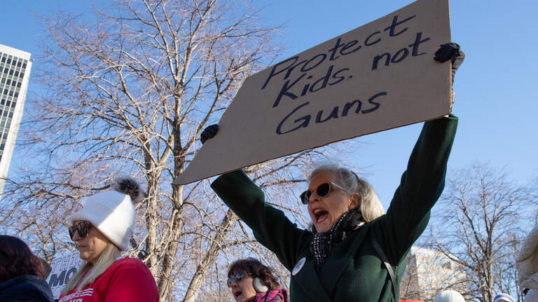 Does Missouri law or Kansas City ordinance prohibit minors from carrying firearms?