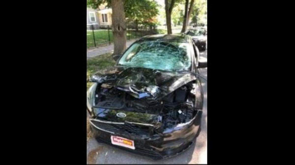 On Sunday, police circulated photos of a black Ford Focus found abandoned several blocks from where the crash scene. The car showed heavy damage to the front end and windshield. A paper temporary tag appeared to have been torn from the car.