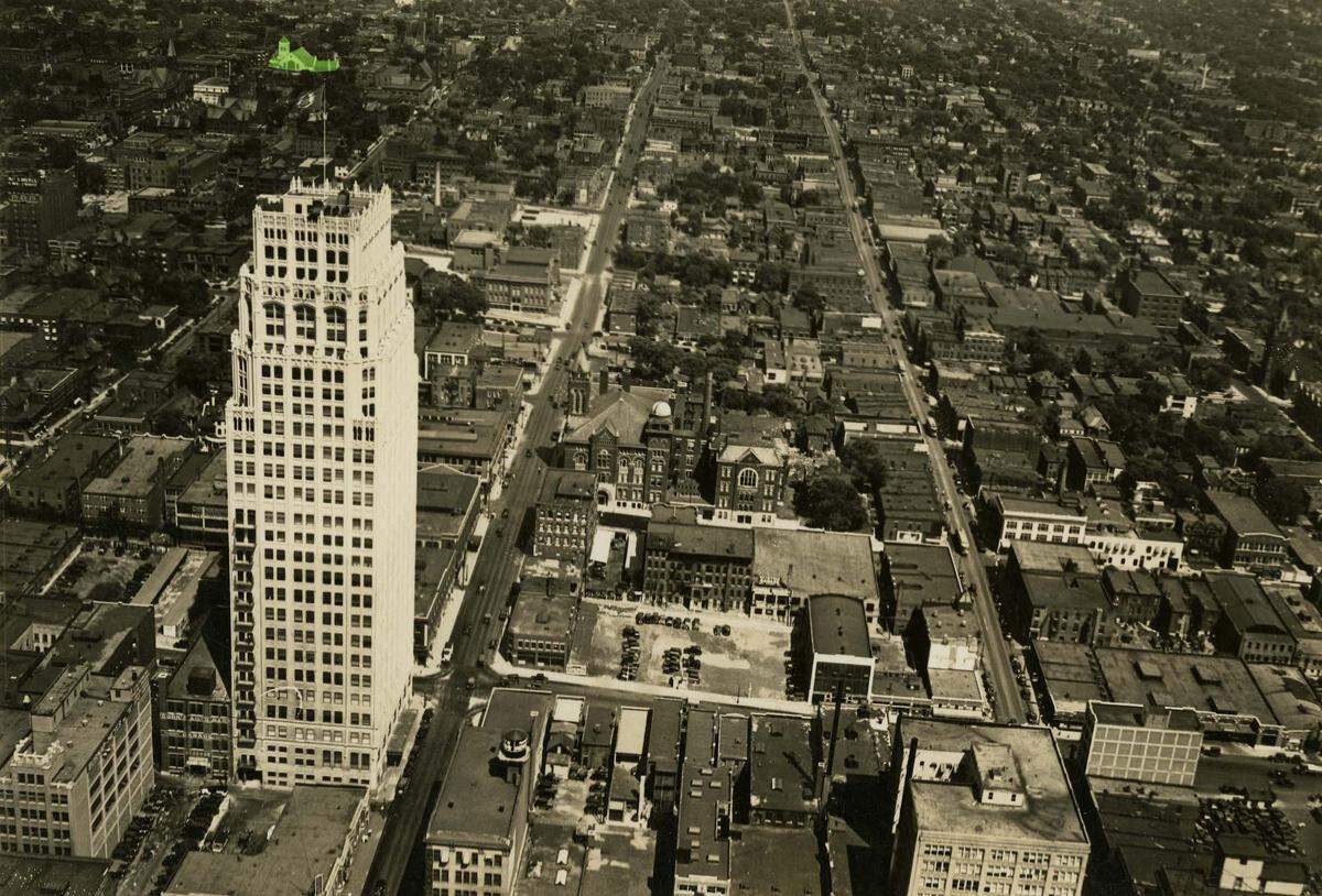 Aerial view showing the urban density immediately east of downtown prior to the urban renewal era. The First Church of Christ Scientist building at Ninth and Forest streets, one of the few structures to survive the clearing is highlighted in green, n.d. 