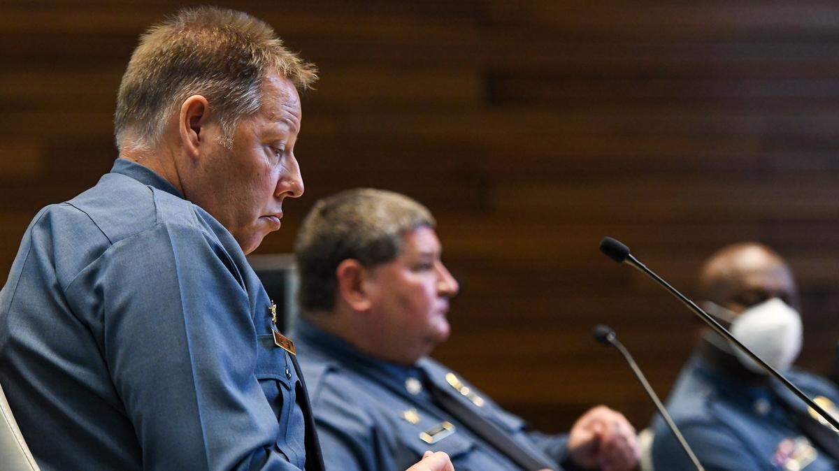 Kansas City Police Chief Rick Smith, from left, and Deputy Chiefs Shawn Wadle and Karl Oakman listen at the monthly Board of Police Commissioners meeting at Kansas City police headquarters Monday, Nov.10, 2020.