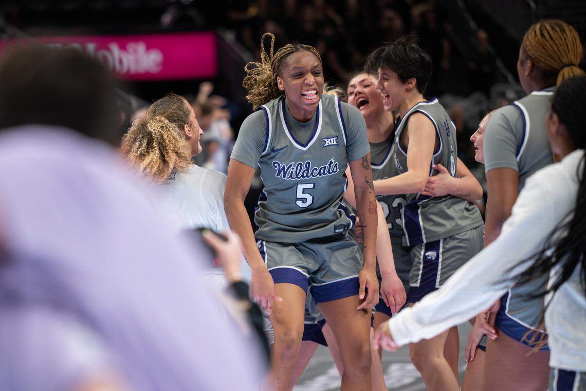 Kansas State Wildcats guard Aniya' Foy (5) celebrates with teammates after defeating Oklahoma State during the third round of the Big 12 Women’s Basketball Tournament.