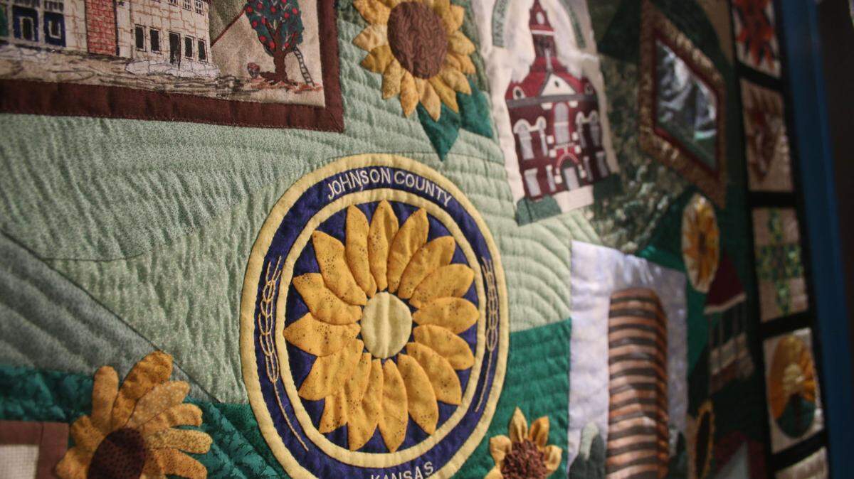 The former Common Threads exhibit at the Johnson County Museum displayed this quilt, which was stitched by the Olathe Quilters Guild to showcase the county’s history.