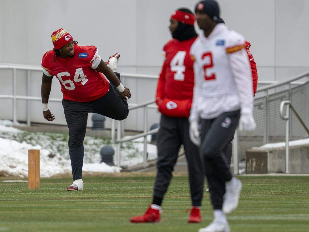 Kansas City Chiefs offensive tackle Wanya Morris (64) stretches during practice on Wednesday, Dec. 3, 2025, in Kansas City.