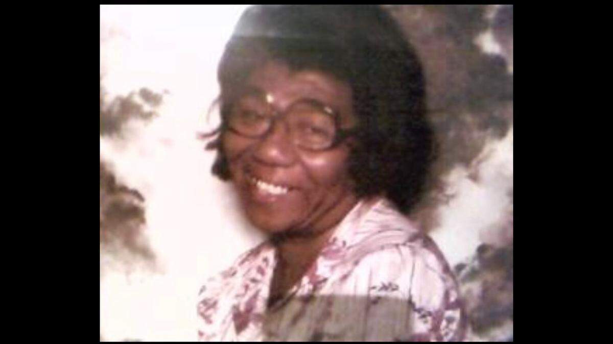 Mildred Smith beams with joy in this snapshot. She spent her career working with young children and, after her retirement, decided to become a foster grandparent to youth in Kansas City.