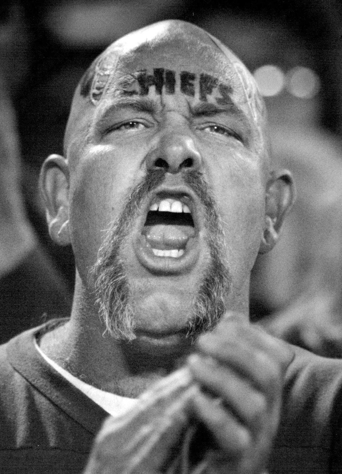 Kansas City Chiefs’ fan Terry DeCourcy of Shawnee painted his face to show his loyalty in 1992.