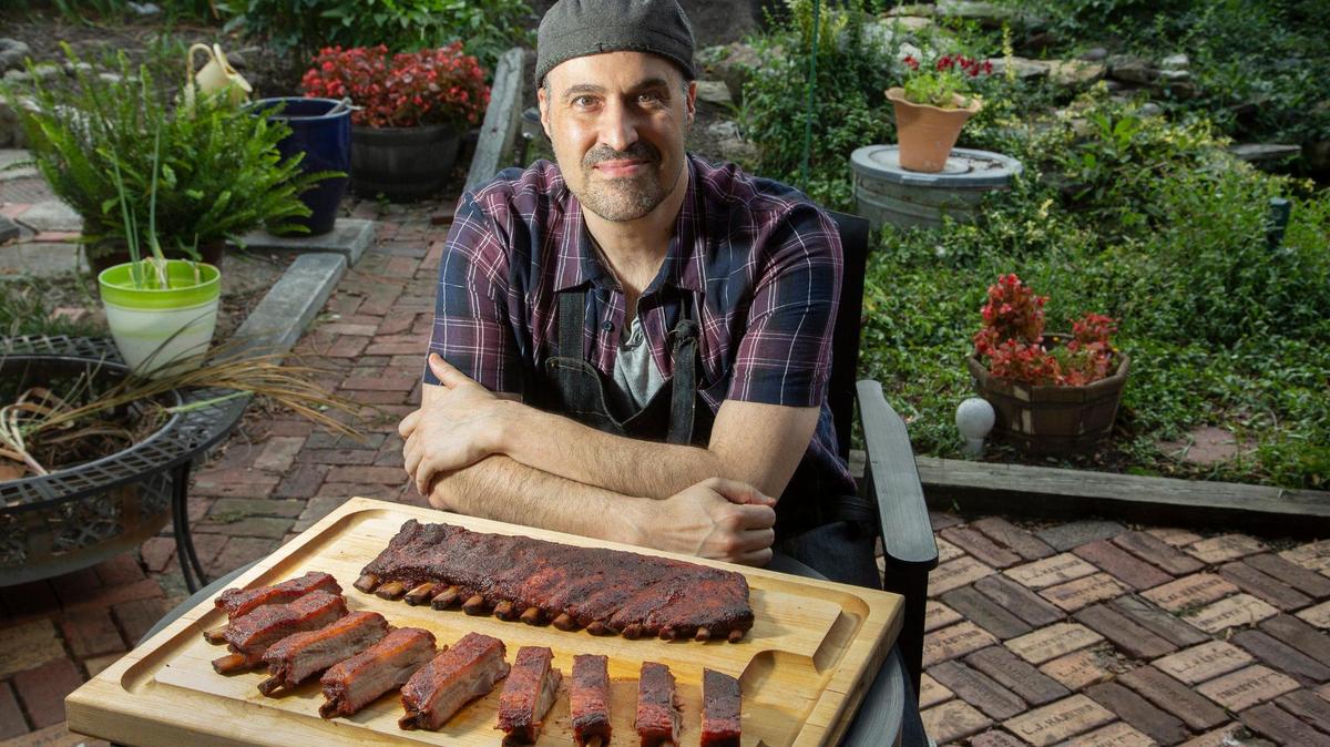 Tim Scott, the executive artistic director for Musical Theater Heritage in Crown Center, says his ribs have just the right amount of heat and sweetness. The right combination of wood is key to smoking ribs, he says.