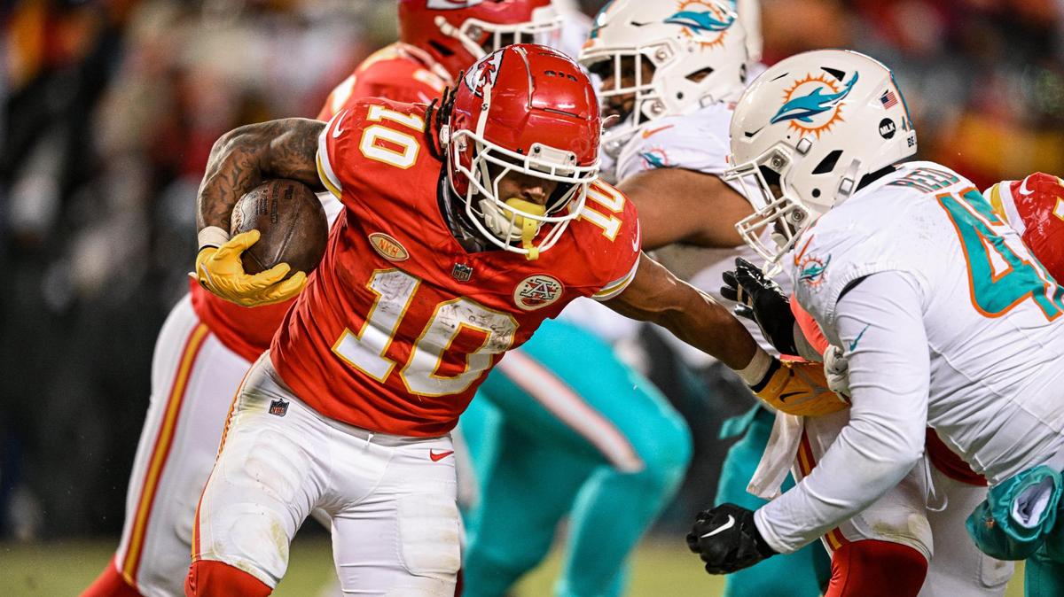 Kansas City Chiefs running back Isiah Pacheco (10) runs for yardage against the Miami Dolphins in the fourth quarter Saturday, Jan. 13, 2024, at GEHA Field at Arrowhead Stadium.