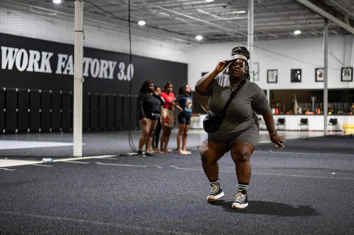 Local hip-hop artist Amira Wang rehearses for her Kansas City People’s Choice Awards performance featuring a dance team and choir.