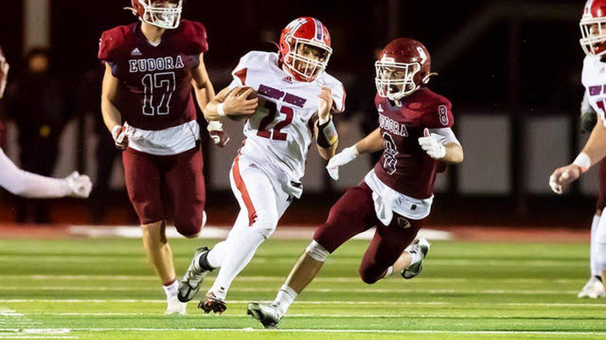 Bishop Miege running back David Garcia Breaks into the open field during the Stags’ 33-26 win over Eudora on Friday night.