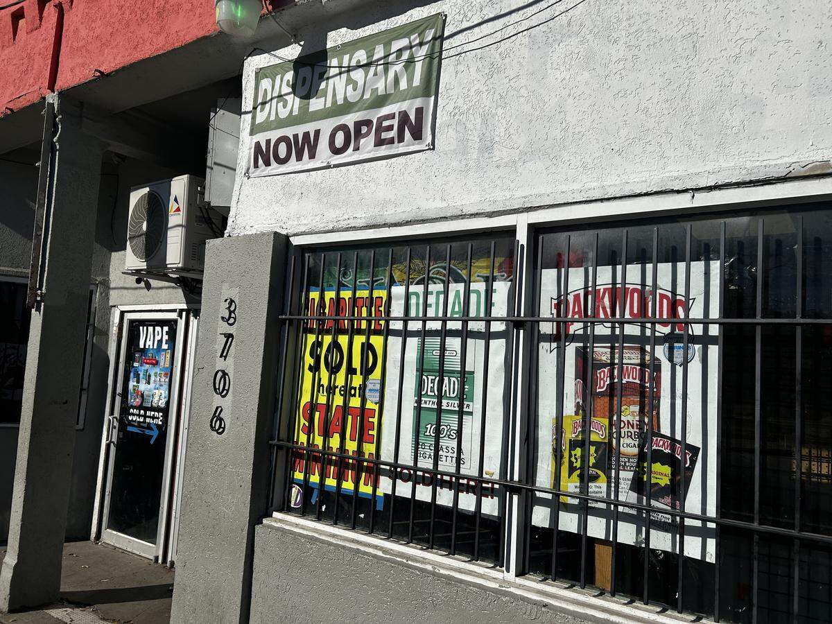 A sign outside Puff Haven in the Northeast says it is a dispensary, but it is not licensed as one.