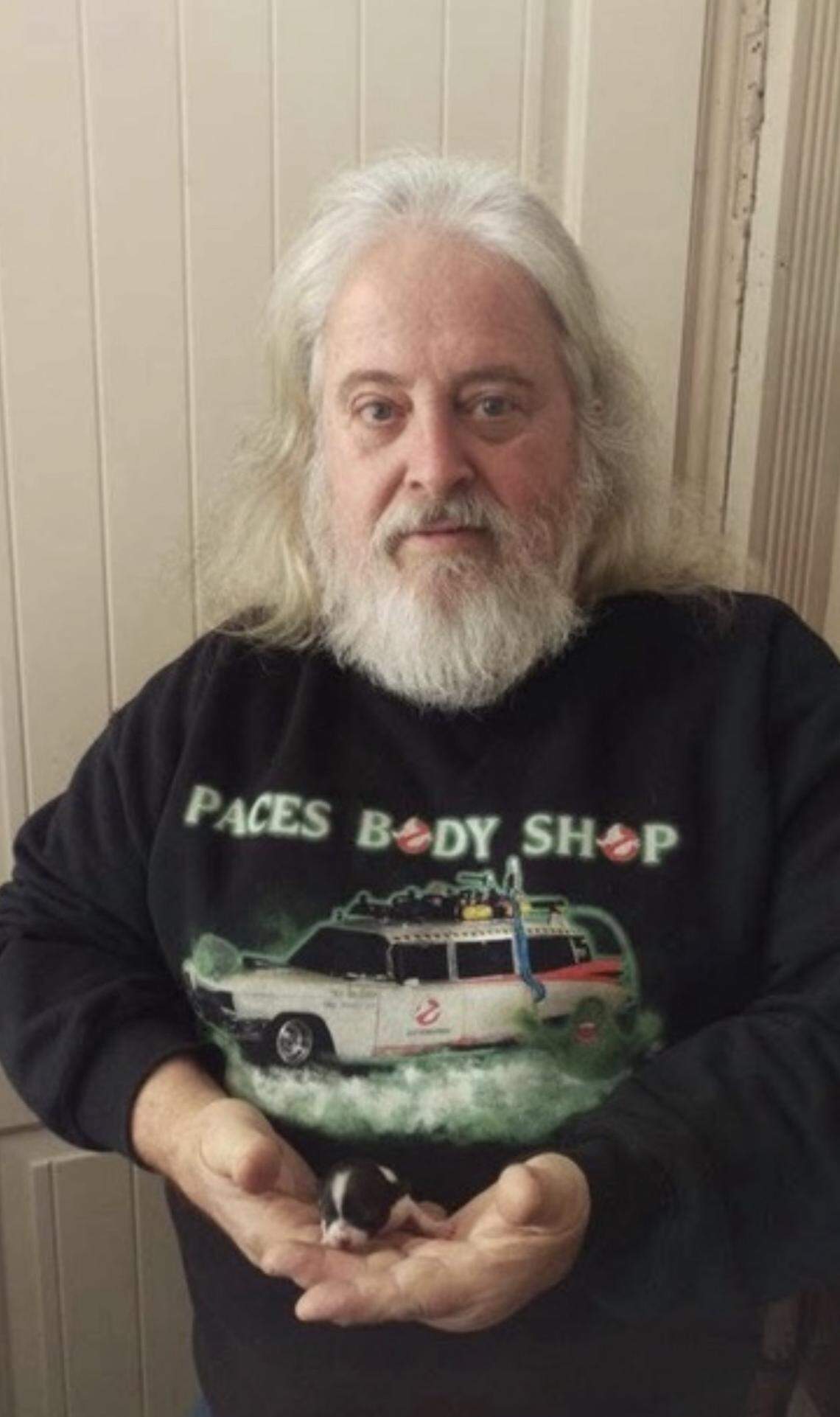 Joe Pace sports a Pace’s Body Shop sweatshirt bearing his most famous creation, a replica of the Ecto-1 from “Ghostbusters.”