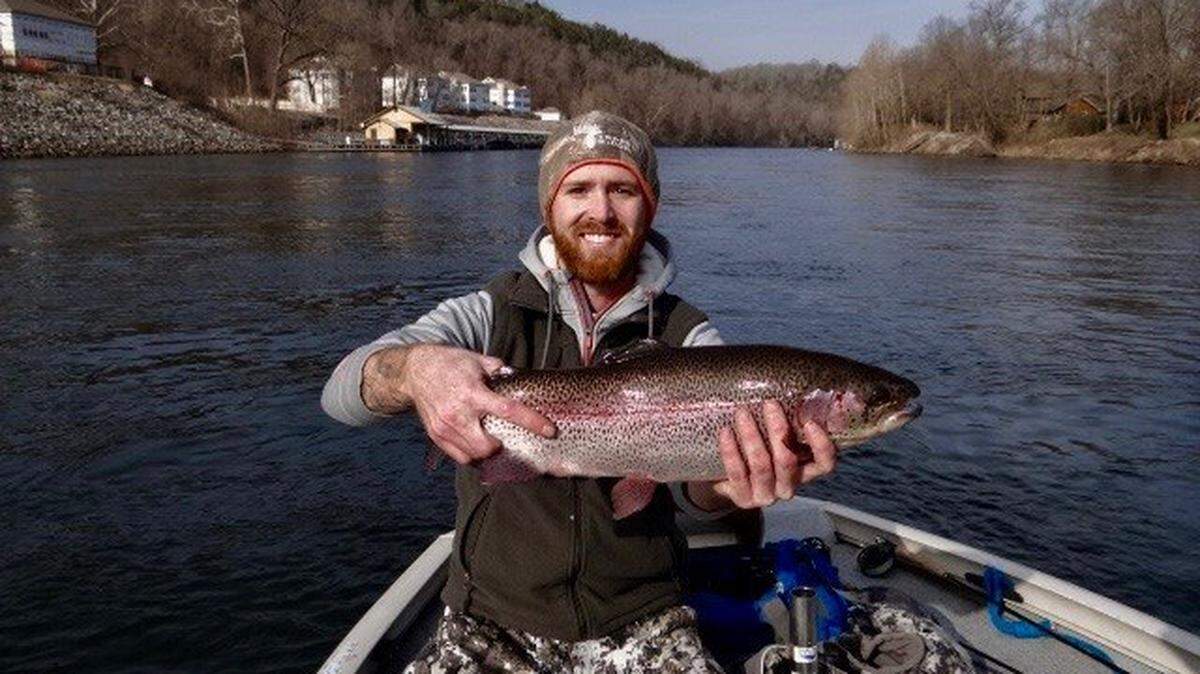 Scott Heminger caught this trophy rainbow trout at Lake Taneycomo during the annual Conservation Federation of Missouri media event, which was hosted at Lilley’s Landing earlier this week. Scott Pauley helped navigate the boat as Heminger landed the 23-inch fish on a fly rod.