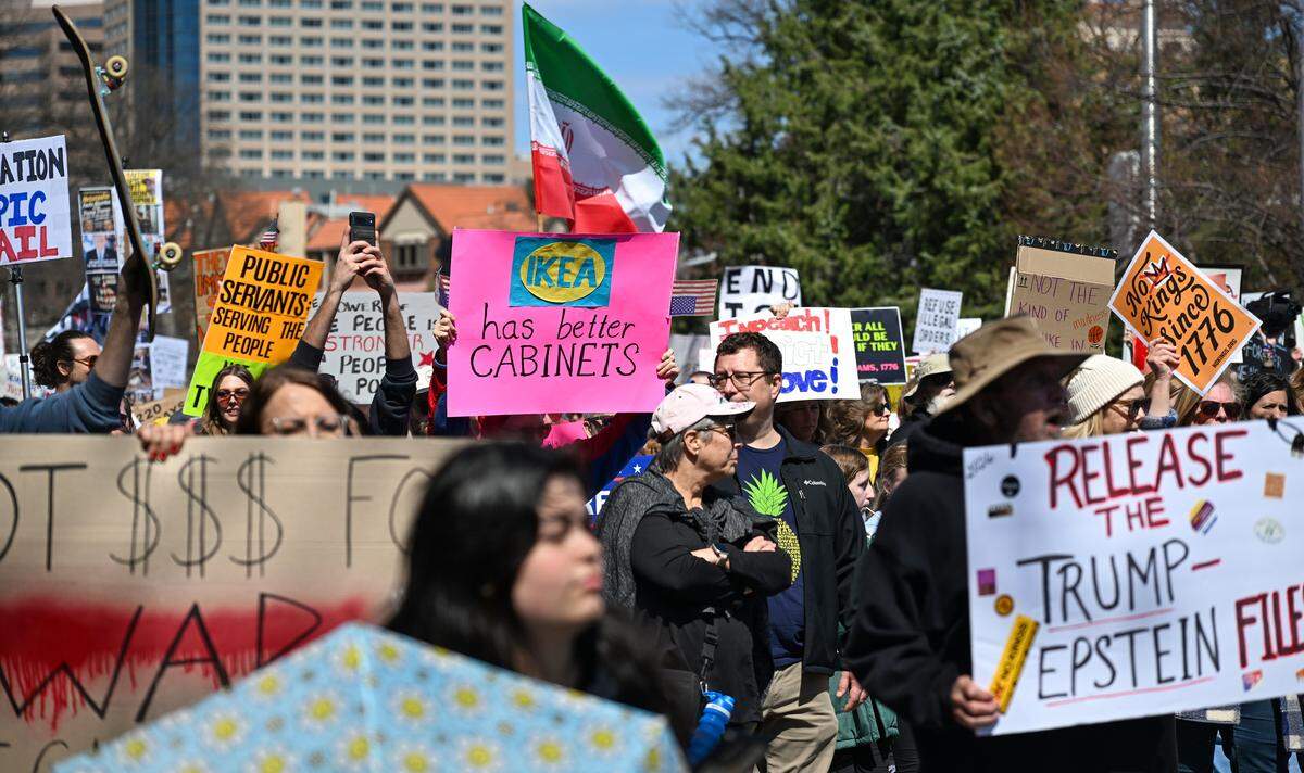Protesters gathered in Mill Creek Park near the Country Club Plaza on Saturday, March 28, 2026, for a No Kings protest against the Trump administration. It's the third round of No Kings protests that have swept the nation over the past year.