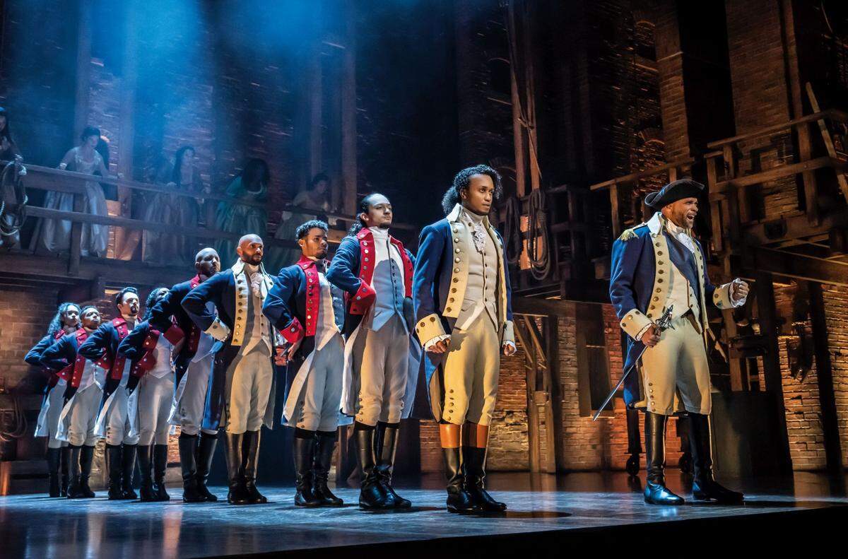 As George Washington, right, Charles Simmons is a leader of a new nation, and a mentor to Alexander Hamilton.
