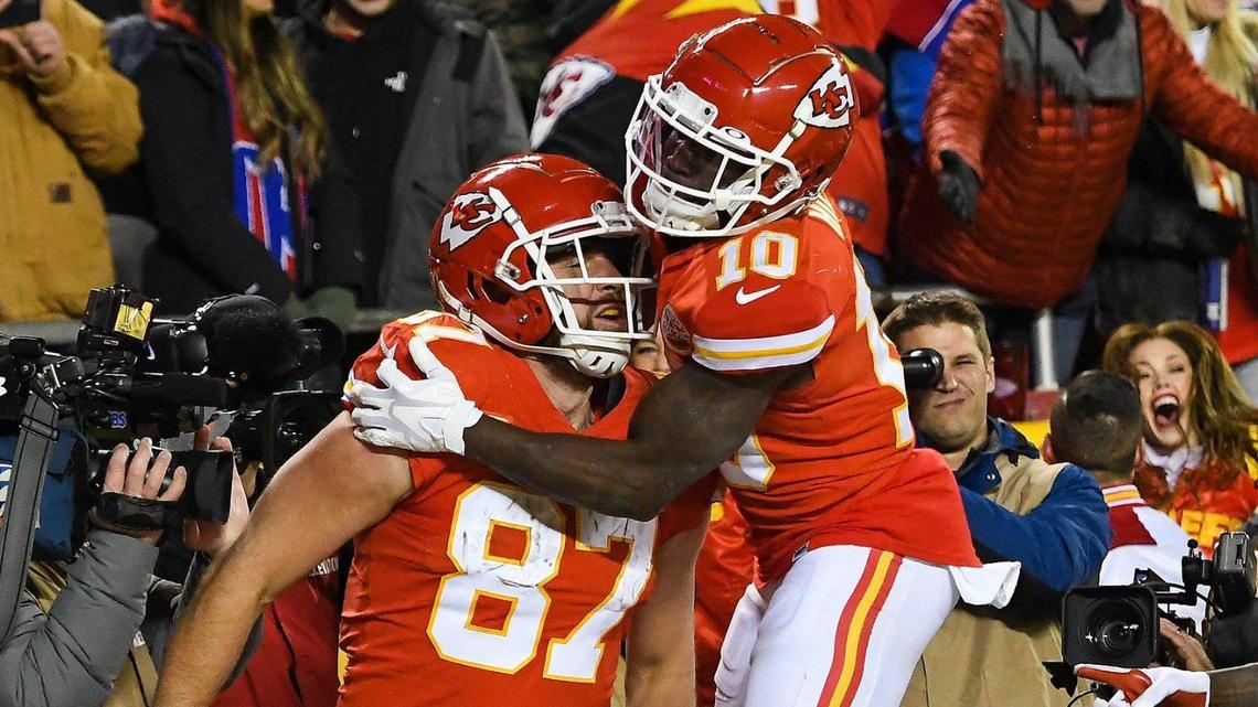 Kansas City Chiefs wide receiver Tyreek Hill celebrates tight end Travis Kelce’s game-winning touchdown in overtime of the AFC Divisional Playoff game against the Buffalo Bills at GEHA Field at Arrowhead Stadium Sunday, Dec. 23, 2022. The Chiefs beat the Bills in 42-36.