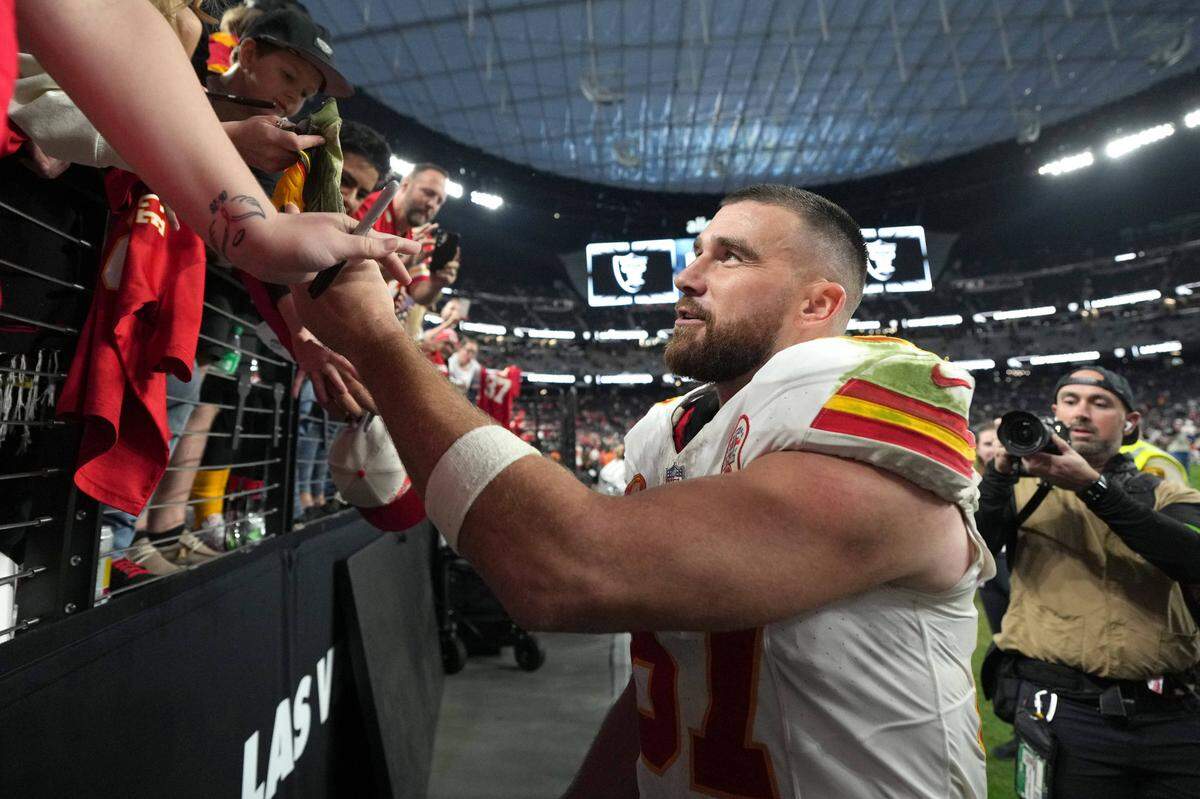 Kansas City Chiefs tight end Travis Kelce interacted with fans after Sunday’s game against the Las Vegas Raiders Allegiant Stadium.