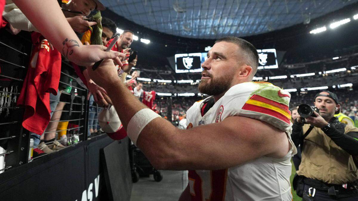 Kansas City Chiefs tight end Travis Kelce interacted with fans after Sunday’s game against the Las Vegas Raiders Allegiant Stadium.