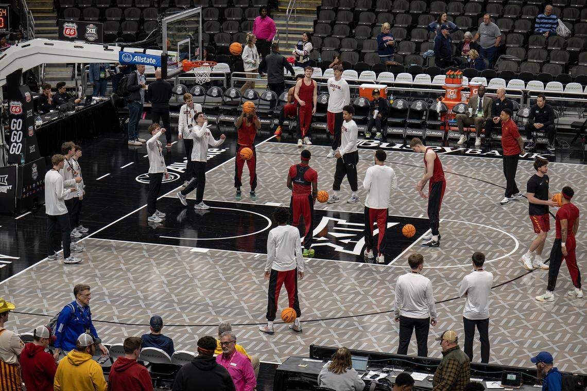 After complaints surfaced about the new glass LED floor at this year’s Big 12 men’s and women’s basketball tournaments, a traditional wood court was installed overnight before the Iowa State-Arizona men’s semifinal game at T-Mobile Center in Kansas City on Friday, March 13, 2026.