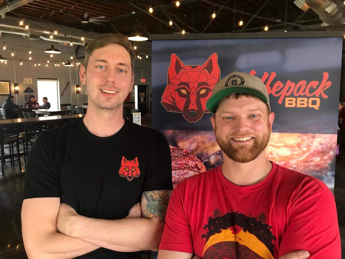 Sam Parker, left, and Jared Wolfe are owners of the new Wolfepack BBQ in North Kansas City.