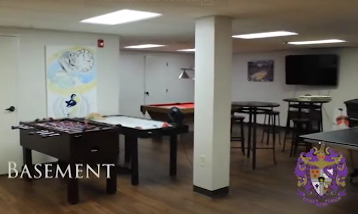A screenshot from a nine-year-old virtual house tour of Sigma Alpha Epsilon shows the basement of the Lawrence fraternity house.