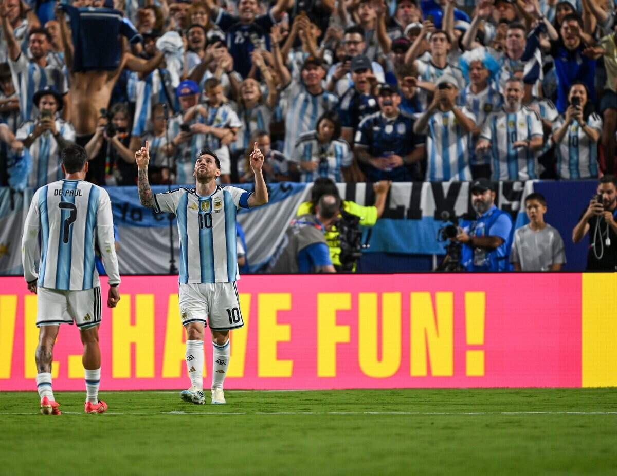 Argentina forward Lionel Messi (10) celebrates after scoring his third goal in the Argentina vs. Algeria FIFA World Cup group-stage soccer match at Kansas City (Arrowhead) Stadium in Kansas City on Tuesday, June 16, 2026.