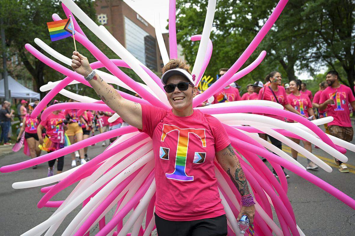 Ame Barnes of Lee’s Summit walked with T-Mobile group during the KC Pride parade in 2023. Floats, performers and community groups participated in the parade which celebrates the LGBTQ+ community.