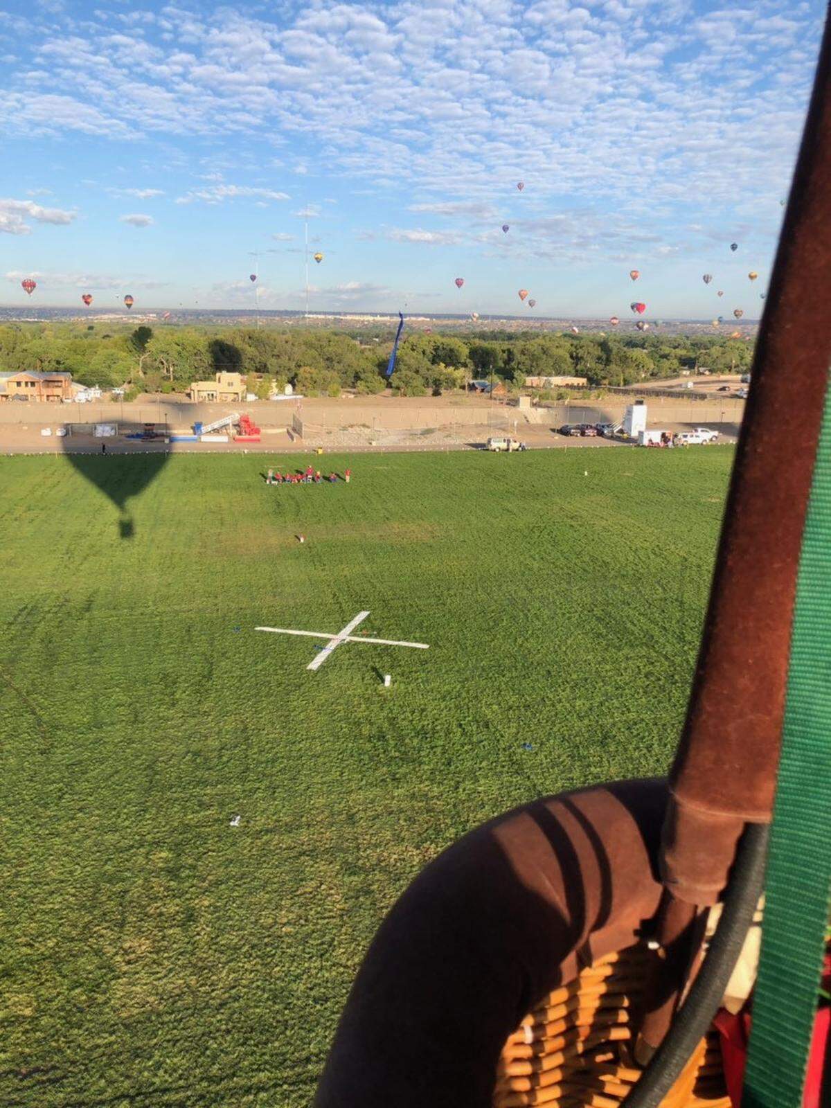 The “Grand Banana 2.0,” piloted by Cody Robinson of Kansas City homes in on a target at the Albuquerque International Balloon Fiesta in 2024.