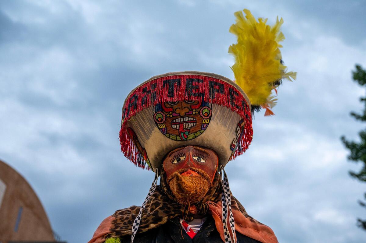 Omar Mendez dresses as a Chinelo during the Cinco de Mayo celebration at Guadalupe Centers on Friday, May 5, 2023, in Kansas City. A Chinelo is a traditional beaded costume from Morelos, Mexico, that showcases a playful and satirical representation of European mannerisms during the colonial period until the late 19th century.