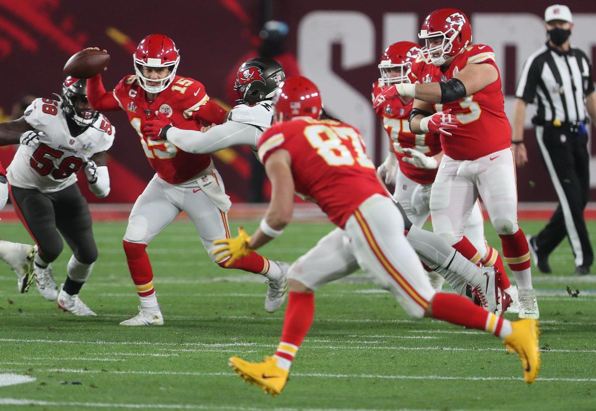 Kansas City Chiefs quarterback Patrick Mahomes looks for tight end Travis Kelce to get open against the Tampa Bay Buccaneers in the second quarter Sunday, February 7, 2021, at Super Bowl LV at Raymond James Stadium in Tampa, Florida.