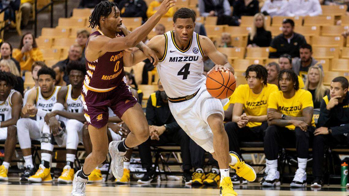Missouri’s Javon Pickett, right, drives past Central Michigan’s Brian Taylor during the second half of an NCAA college basketball game Tuesday, Nov. 9, 2021, in Columbia, Mo. (AP Photo/L.G. Patterson)