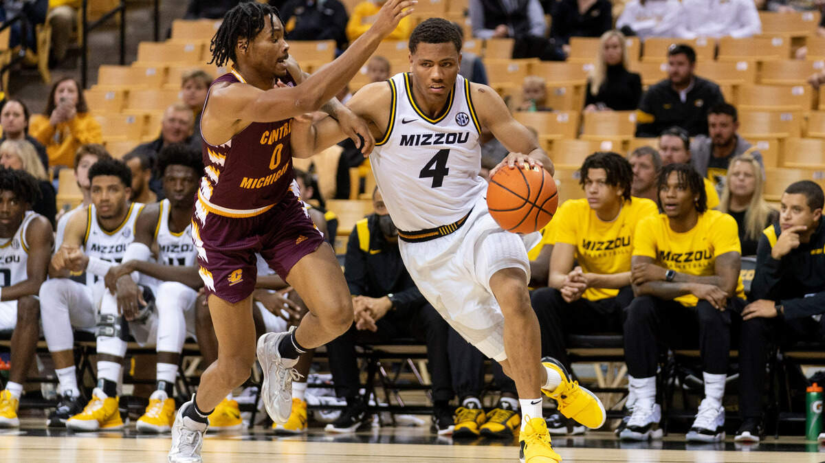 Missouri’s Javon Pickett, right, drives past Central Michigan’s Brian Taylor during the second half of an NCAA college basketball game Tuesday, Nov. 9, 2021, in Columbia, Mo. (AP Photo/L.G. Patterson)