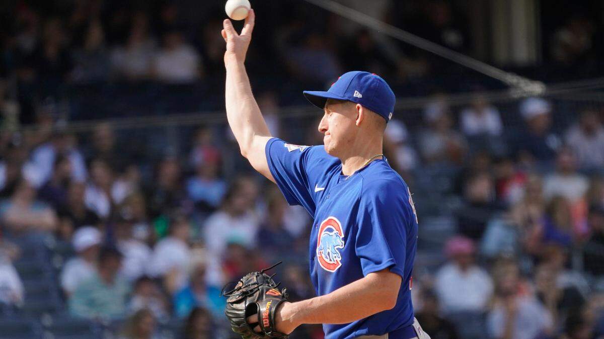 Chicago Cubs first baseman Frank Schwindel pitches in the eighth inning of a baseball game against the New York Yankees, Sunday, June 12, 2022, in New York. (AP Photo/Mary Altaffer)