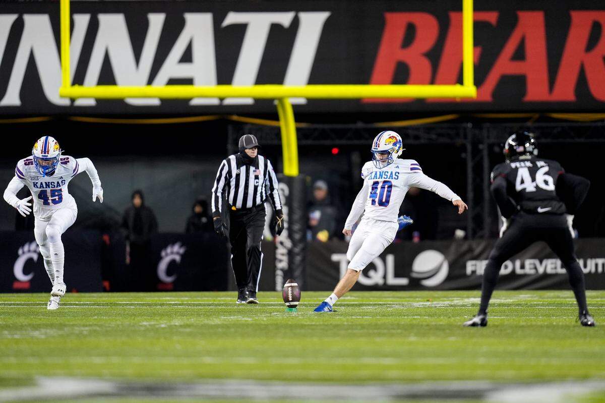 Kansas kicker Tabor Allen (40) kicks off during the second half of the game between the Cincinnati Bearcats and Kansas Jayhawks on Saturday, Nov. 25, 2023, at Nippert Stadium in Cincinnati.