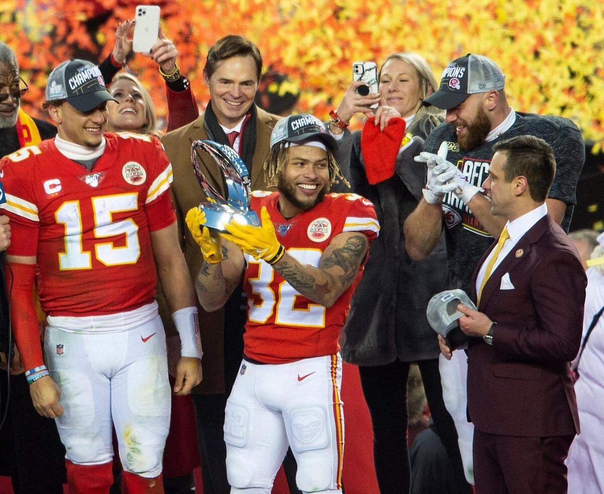 Chiefs general manager Brett Veach, right, was on the stage with quarterback Patrick Mahomes, left, and safety Tyrann Mathieu after the Chiefs won the AFC Championship Game against Tennessee in January 2020. Veach’s role in finding and signing talent played a crucial role in the Chiefs’ run to consecutive Super Bowl appearances.