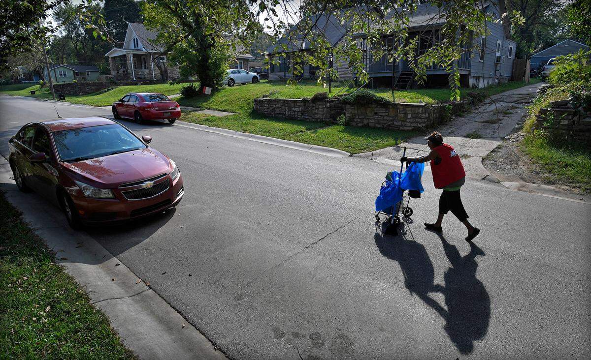 Minnie Mitchem hits the streets every day to pick up trash, pull weeds and mow lawns, all to keep her East Side neighborhood looking good.