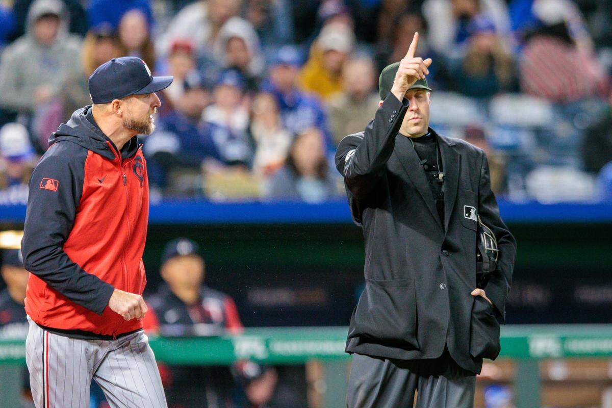 Minnesota Twins manager Rocco Baldelli, left, was ejected during the sixth inning of a Major League Baseball game against the Royals at Kauffman Stadium in Kansas City on Monday, April 7, 2025.