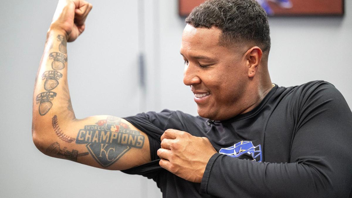 Asked if he had any tattoos representing Kansas City, Royals catcher Salvador Perez flexed the one on his bicep memorializing the 2015 World Series won by the Royals with Perez as the series MVP.