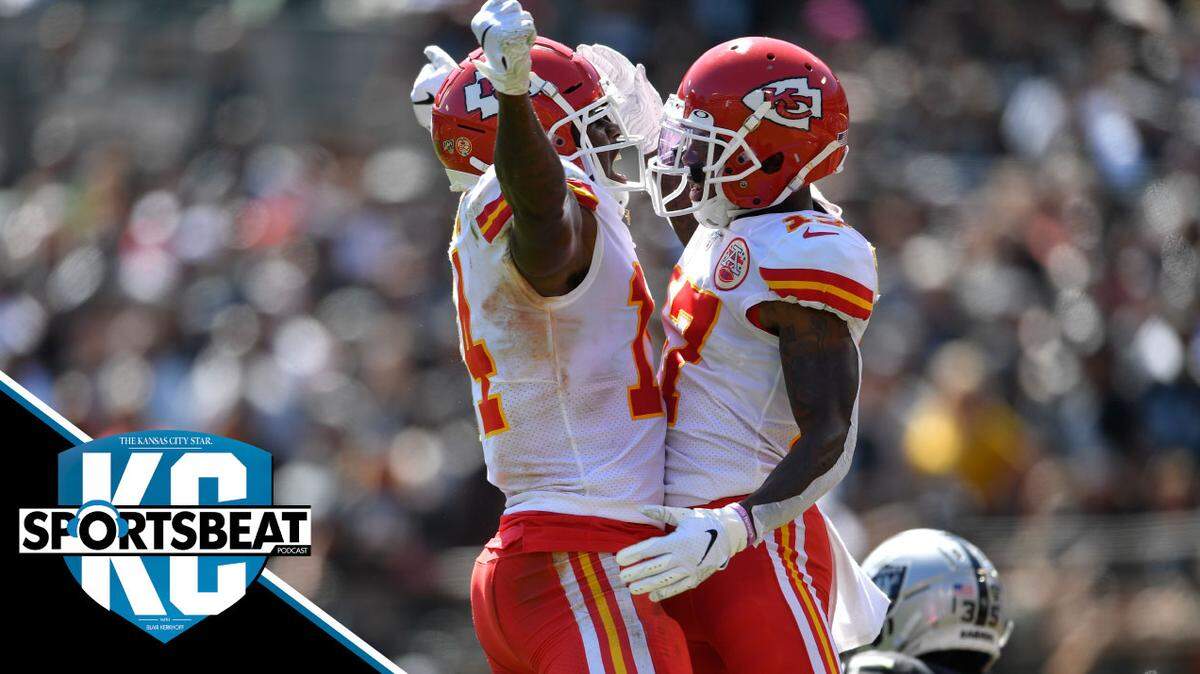 Kansas City Chiefs teammates Sammy Watkins, left, and Mecole Hardman celebrate after Hardman’s touchdown catch in the first half of Sunday’s game at Oakland Alameda County Coliseum.