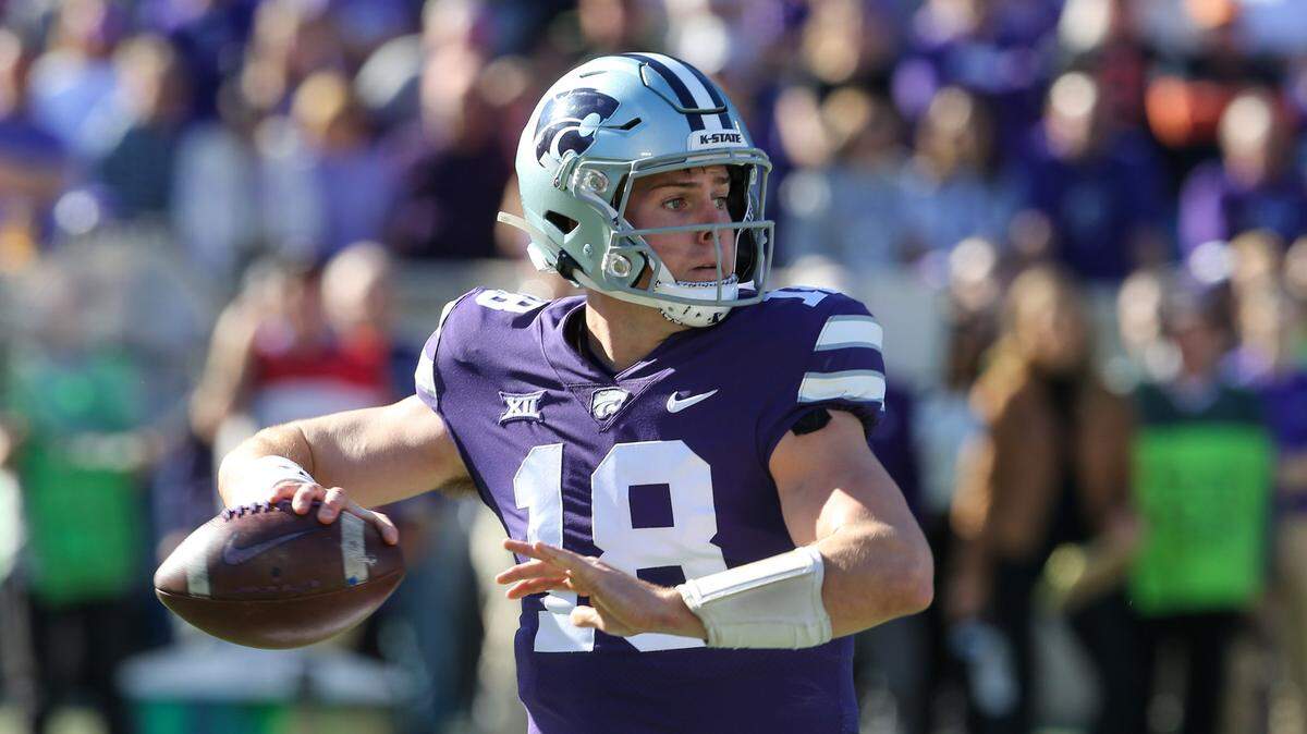Kansas State Wildcats quarterback Will Howard (18) drops back to pass during the first quarter against the Oklahoma State Cowboys at Bill Snyder Family Football Stadium on Oct. 29, 2022.