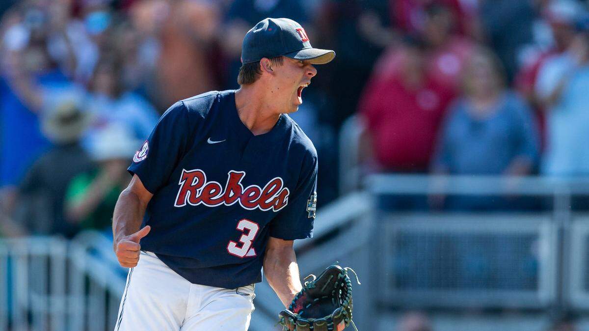 Mississippi pitcher Brandon Johnson (37) celebrates a win over Oklahoma in Game 2 of the NCAA College World Series baseball finals, Sunday, June 26, 2022, in Omaha, Neb. (AP Photo/John Peterson)