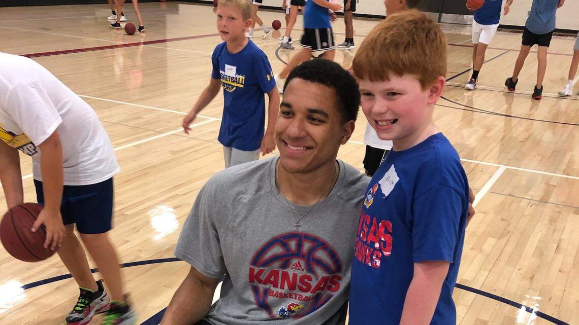 KU senior wing Kevin McCullar worked Washburn coach Brett Ballard’s camp for youths on Thursday at Eudora High.