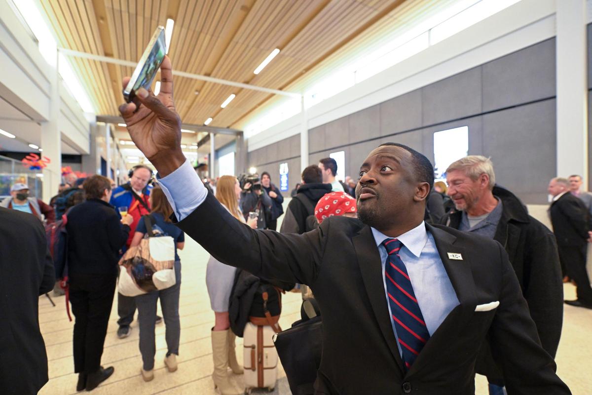 Former Kansas City Missouri city councilman Jermaine Reed videotaped the new $1.5 billion single terminal at Kansas City International Airport after he arrived on the first flight in from Chicago on Tuesday, Feb. 28, 2023.