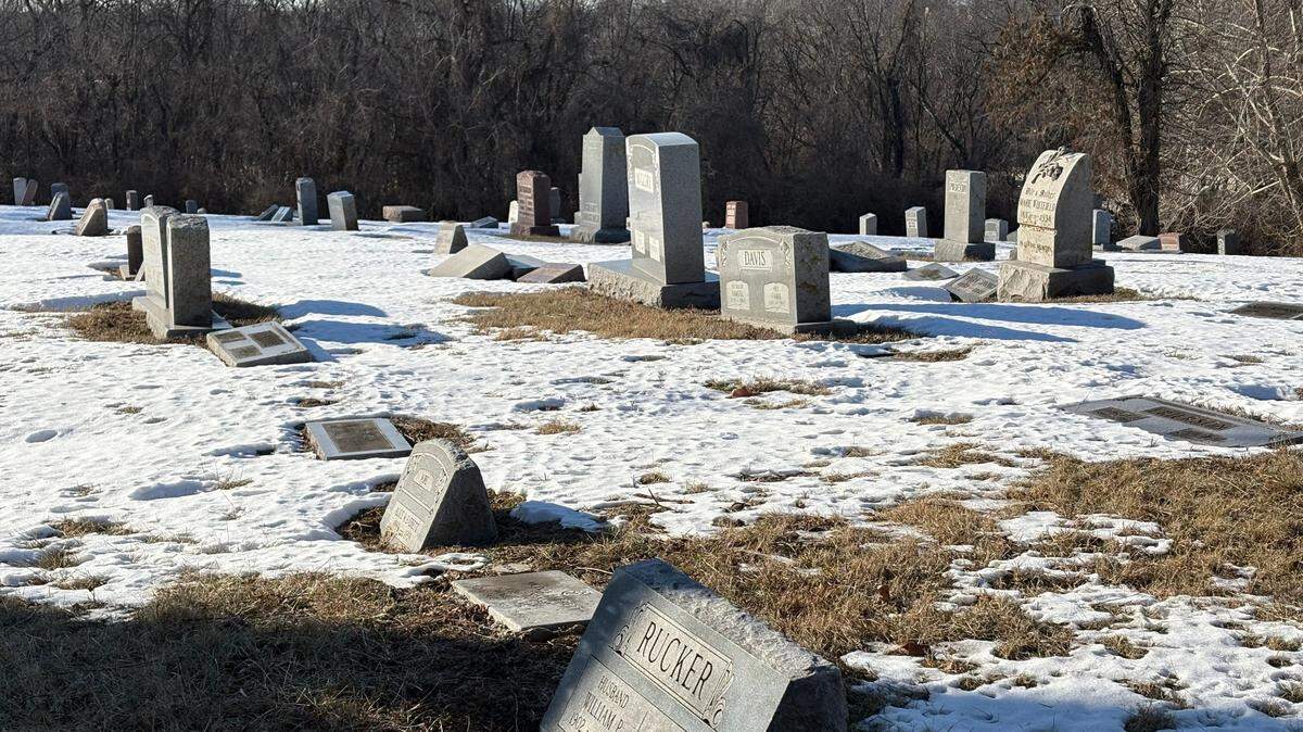 Rows of headstones are seen at Highland Cemetery along Blue Ridge Boulevard in Jackson County on Thursday, Jan. 23. Highland has been owned since 2010 by the Jackson County Land Trust, which tries to maintain the grounds and keep them open to the public.
