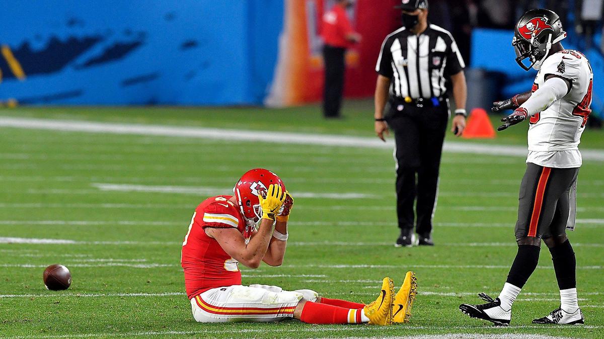 Tampa Bay Buccaneers inside linebacker Devin White signals incomplete pass over Kansas City Chiefs tight end Travis Kelce after Kelce couldn’t hold onto the ball for a third down conversion in the third quarter Sunday, February 7, 2021, at Super Bowl LV at Raymond James Stadium in Tampa, Florida.