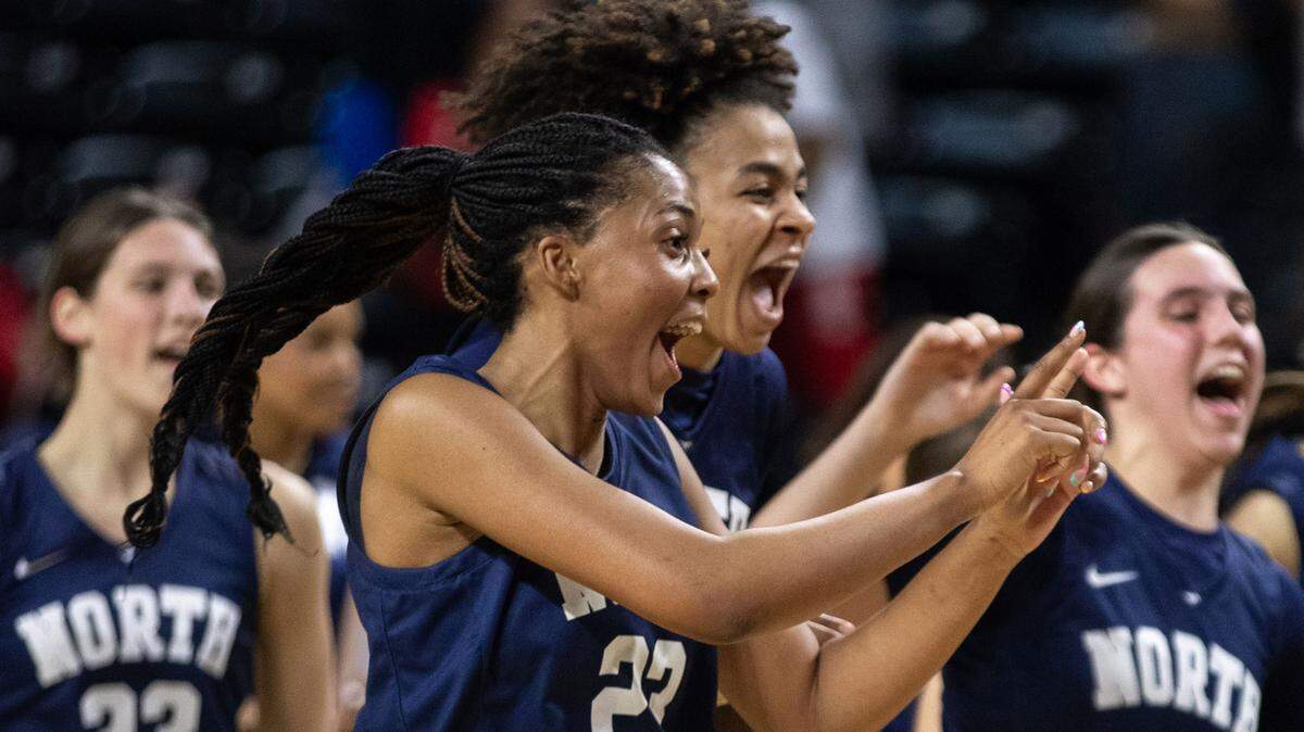 Aubrey Shaw (front) and Jaliya Davis celebrate as Blue Valley North advanced Friday, March 14, 2025, to the Kansas Class 6A title game.