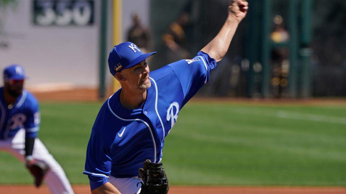 Kansas City Royals’ Mike Minor pitches during the first inning of the team’s spring training baseball game against the San Diego Padres, Monday, March 22, 2021, in Surprise, Ariz. (AP Photo/Sue Ogrocki)